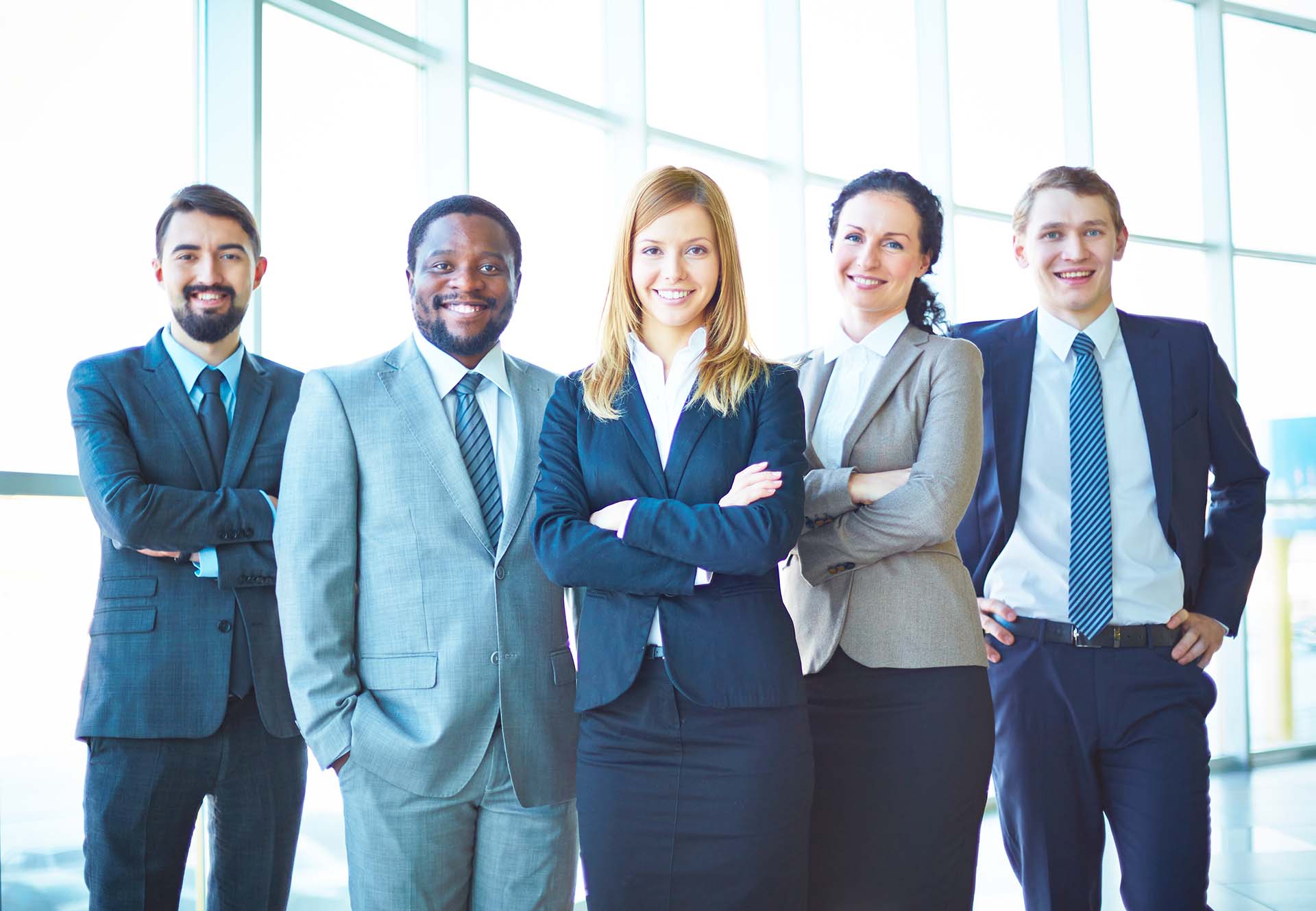 group of glendale arizona attorneys standing next to window