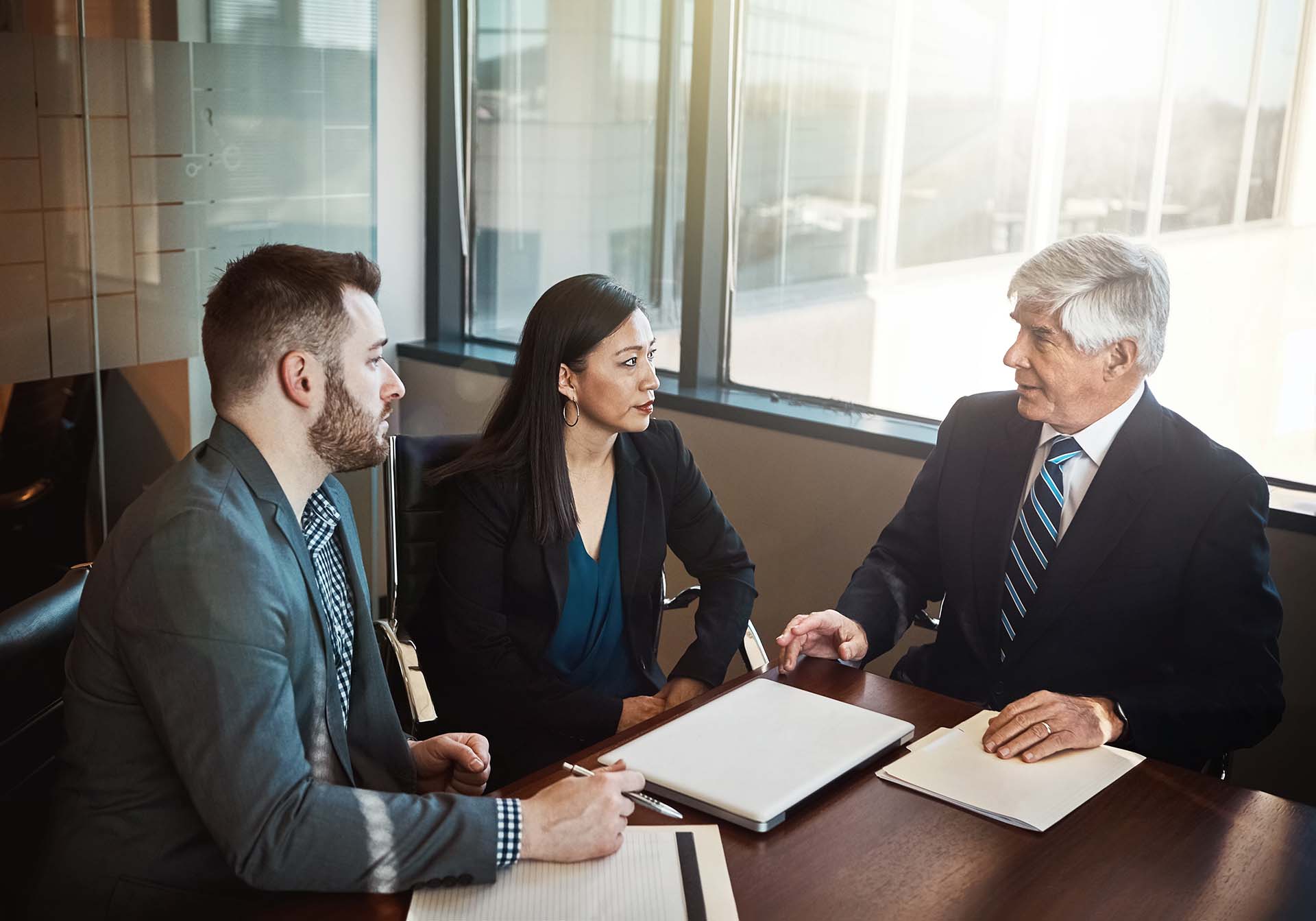 attorneys in avondale arizona sitting in law firm conference room