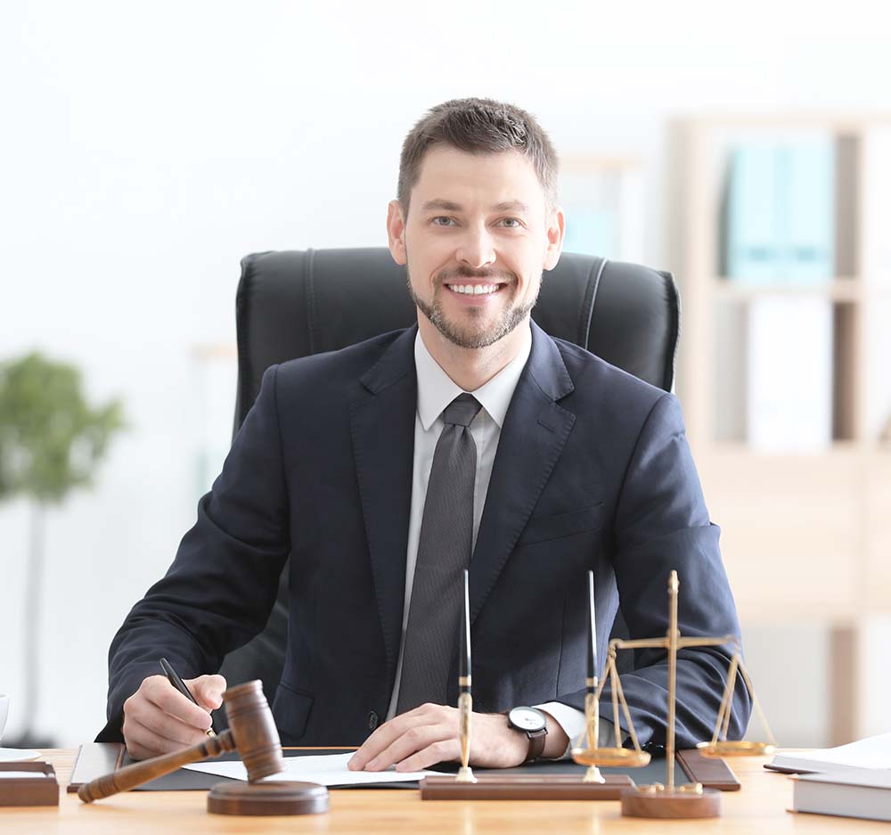 stockton california male attorney sitting at lawyers desk