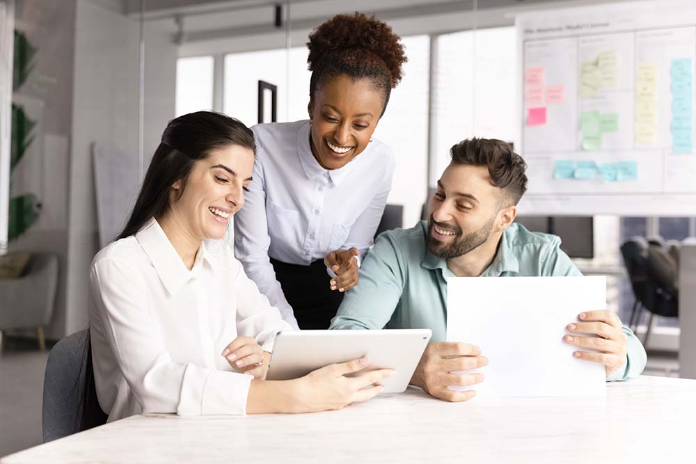 SEO professionals sitting at table discussing SEO