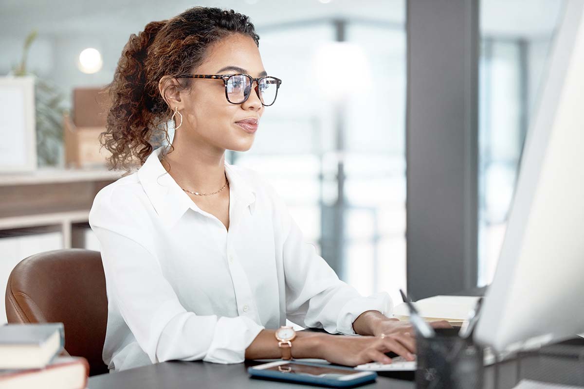 female attorney working on law firm content marketing