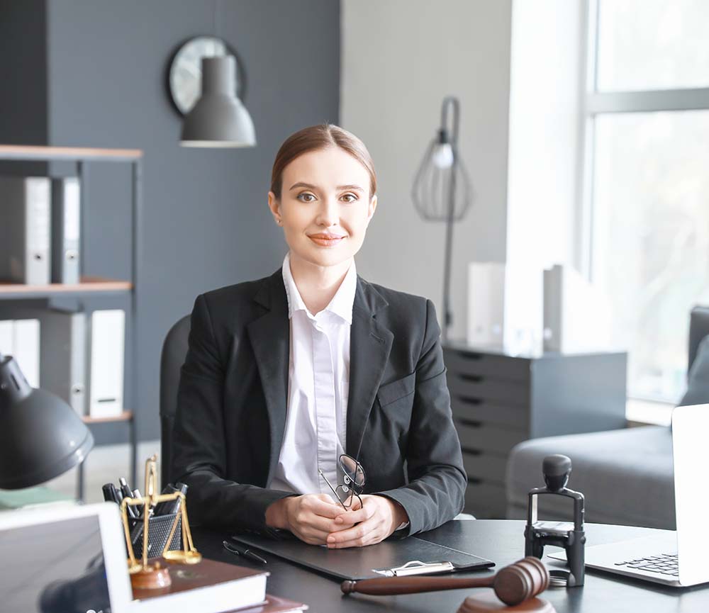 female attorney in phoenix az law firm sitting at desk