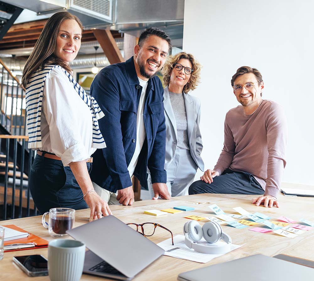 seo professionals for law firm standing next to table