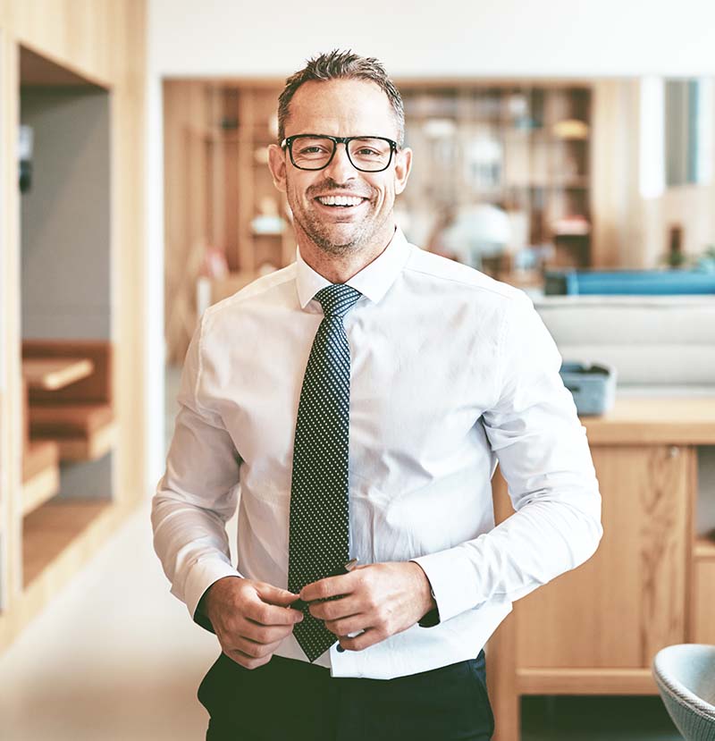 male attorney standing in law firm room