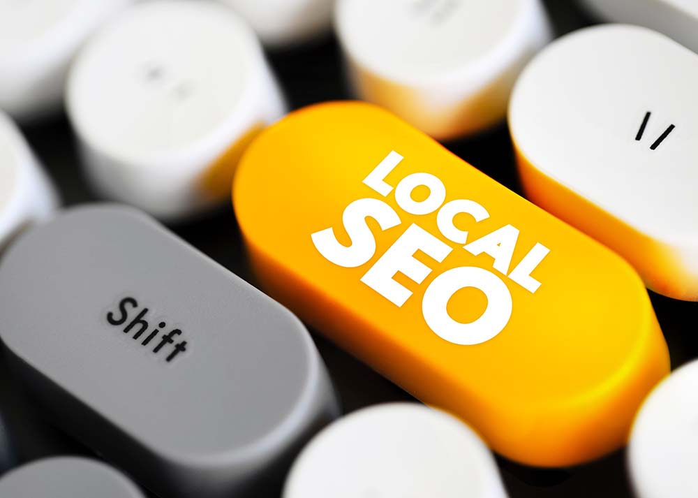 a keyboard with a button titled "local seo"
